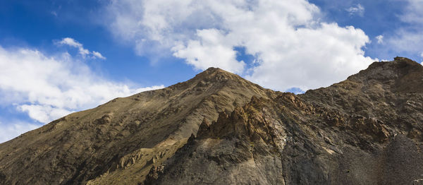 Low angle view of mountain against sky