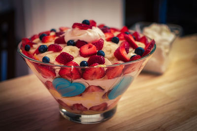 Close-up of strawberries in glass on table