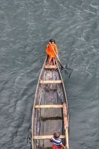 High angle view of man sailing on river