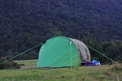 Tent in mountain against sky