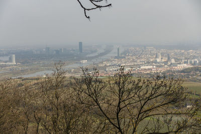 Aerial view of cityscape against sky