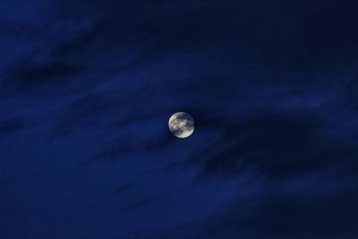 Low angle view of moon against sky