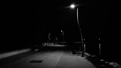 Illuminated street lights at night