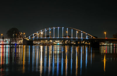 View on the wilhelmina bridge at the river ijssel near deventer in the netherlands by night