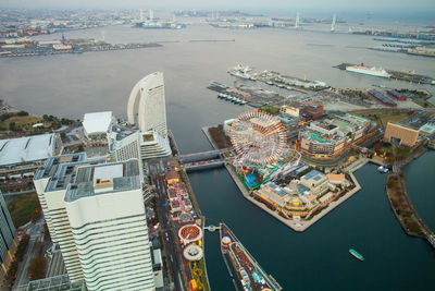 High angle view of ferris wheel in city