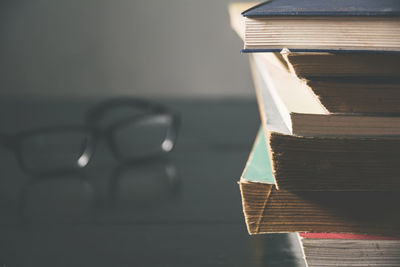 Close-up of stacked books on table