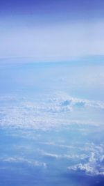 Scenic view of landscape against blue sky