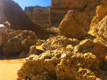 Rock formations on a beach in albufeira, algarve