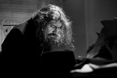 Close-up of young woman sitting outdoors