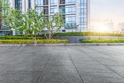 Footpath by building against sky