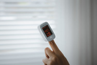 Close-up of person holding mobile phone