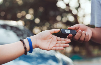 Close-up of person using mobile phone