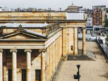 Exterior of historic building against sky in city