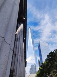 Low angle view of modern buildings against sky