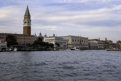 View of buildings against cloudy sky in venice 