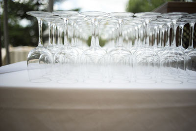Close-up of upside down empty wineglasses on table