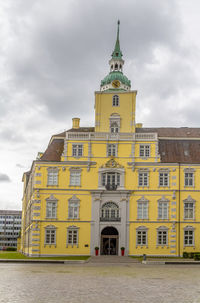 Building against cloudy sky