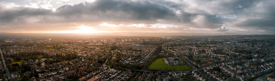 High angle view of city against sky during sunset