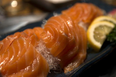 Close-up of salmon in tray