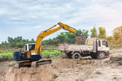 Construction site on field against sky