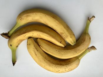 High angle view of bananas on white background