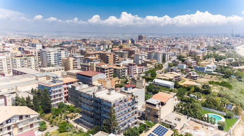 High angle shot of townscape against sky