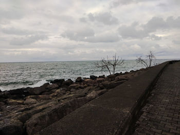 Scenic view of beach against sky