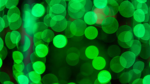 Defocused image of illuminated lights at night