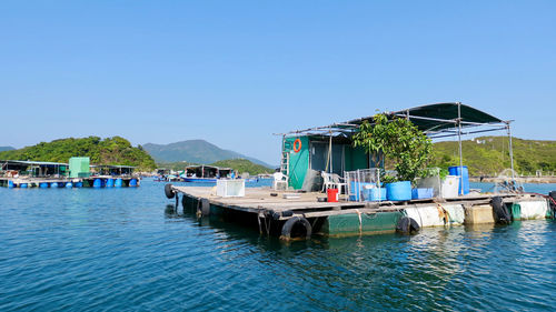 Scenic view of swimming pool against clear blue sky