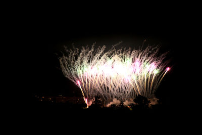 Firework display at night