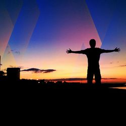 Silhouette of woman against clear sky at sunset