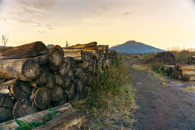 Scenic view of land against sky during sunset