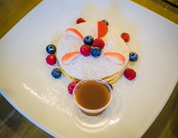 High angle view of cake served on table