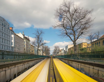 View of bridge over canal in city