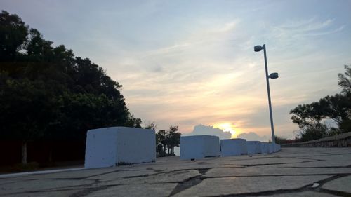 Low angle view of building against cloudy sky