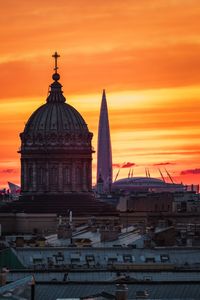 View of cathedral against orange sky