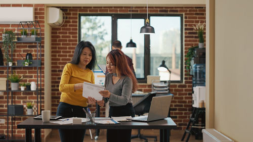 Business colleagues brainstorming in office