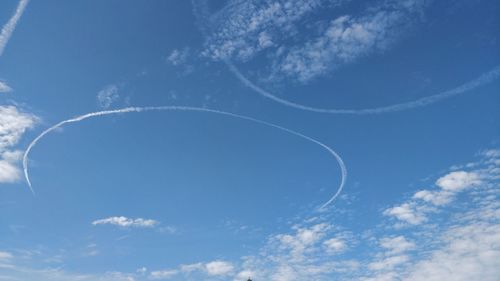 Low angle view of vapor trail in sky