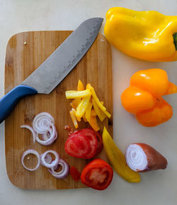 High angle view of chopped vegetables on cutting board