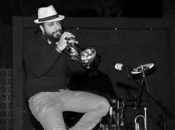 Man playing trumpet at concert