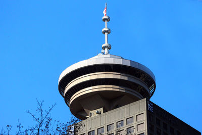 Low angle view of building against blue sky