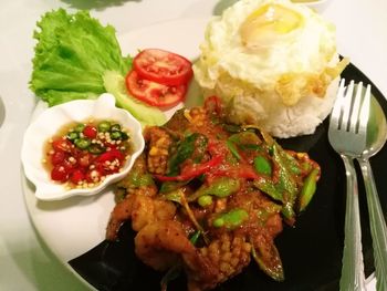 High angle view of salad in plate on table