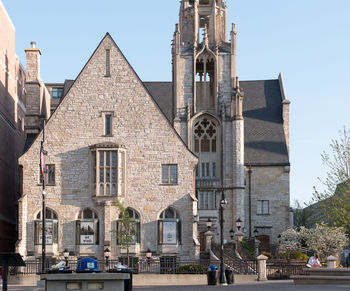 Exterior of buildings in city against sky