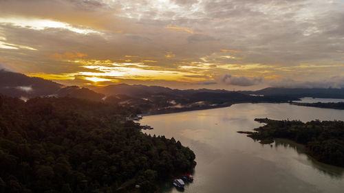 Scenic view of mountains against sky during sunset