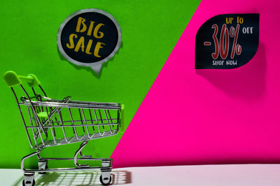 Close-up of information sign on wall