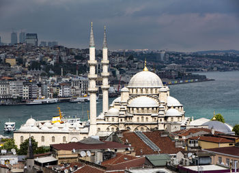 High angle view of city buildings against sky