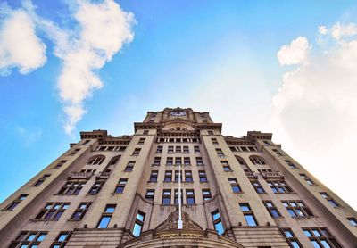 Low angle view of royal liver building against sky