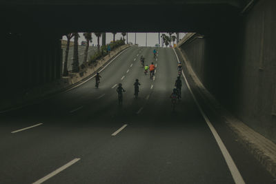 People walking on road in city