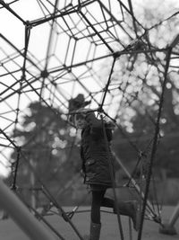 Low angle view of girl on playground 