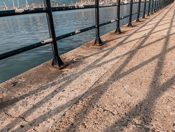 High angle view of wooden posts on river